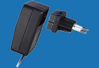 WALL-MOUNTED X-SERIES Universal Switching Adaptors with Interchangeable AC Plugs (up to 6W)